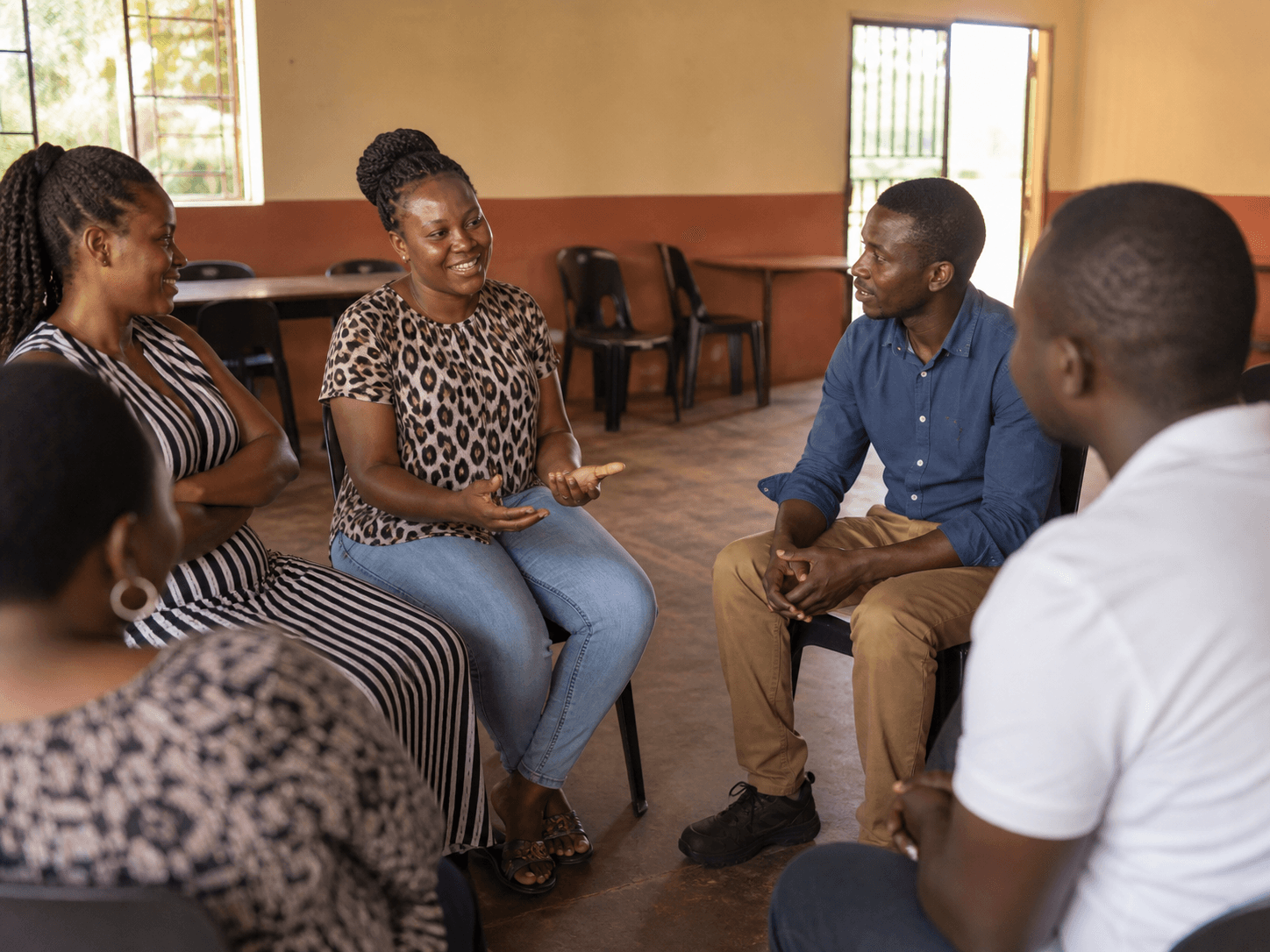 Adults taking part in a welcoming peer support group